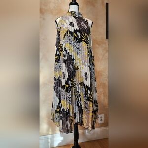 NEW pleated halter dress. Size 8 Tie in the back. Flowy Design.